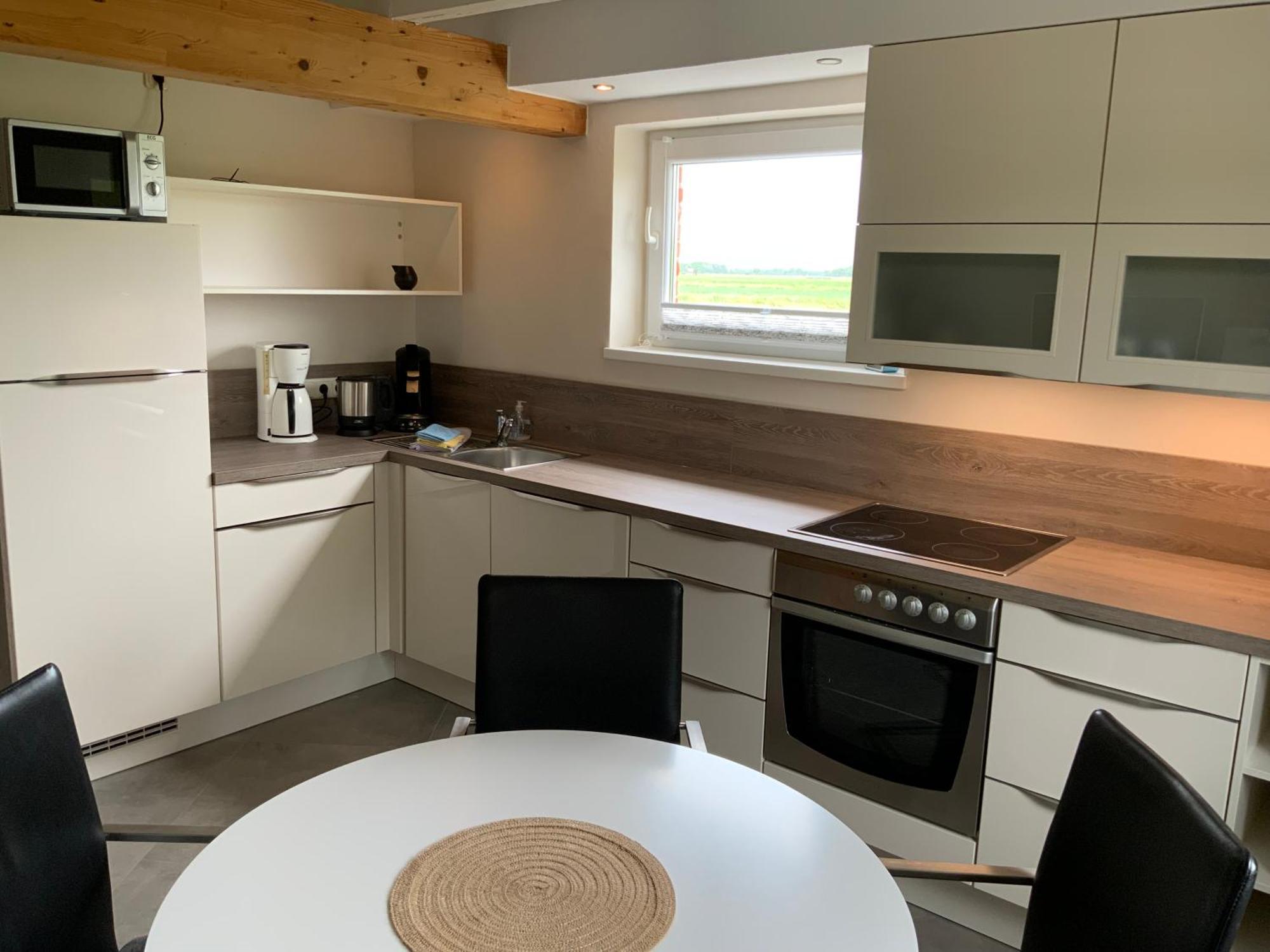 Ferienwohnungen Zollhaus Utlandshoern Norden Kamer foto